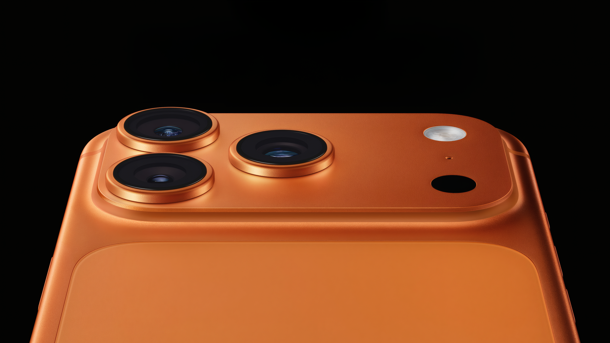 Камеры оранжевого iPhone крупным планом